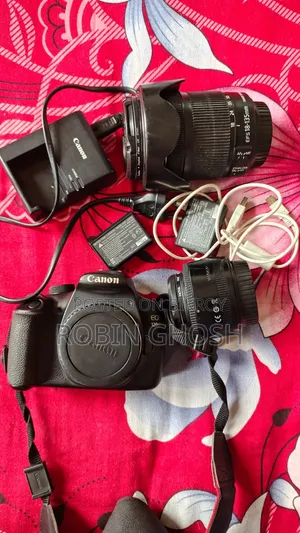 Camera 1200D With Prime and 18-135mm Lens.