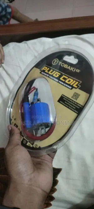 Tobaci Racing Coin and Tobaci Spark Plug