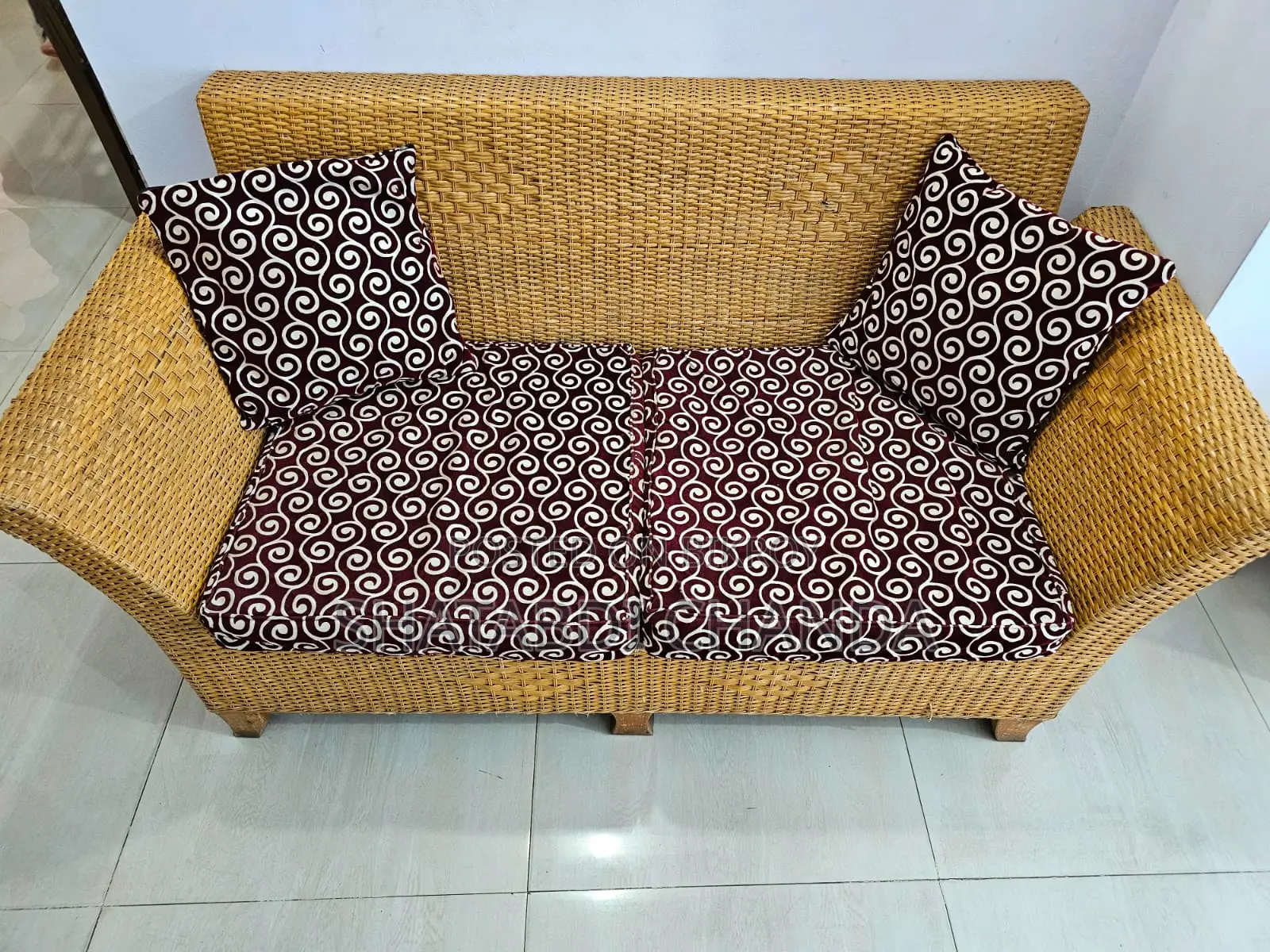 This rattan sofa set will be sold.