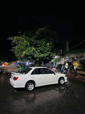 টয়োটা করিনা ২০০০ সাদা