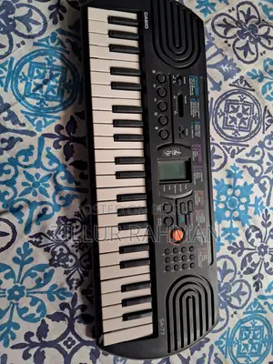 Casio SA-77 Portable Musical Keyboard Piano