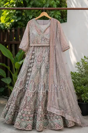 Indian Designer Embroidered Lehenga With Matching Stylish Potli Bag
