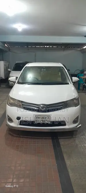 টয়োটা অ্যাক্সিও ১.৫ জি ২ডব্লিউডি ২০১৪ হোয়াইট