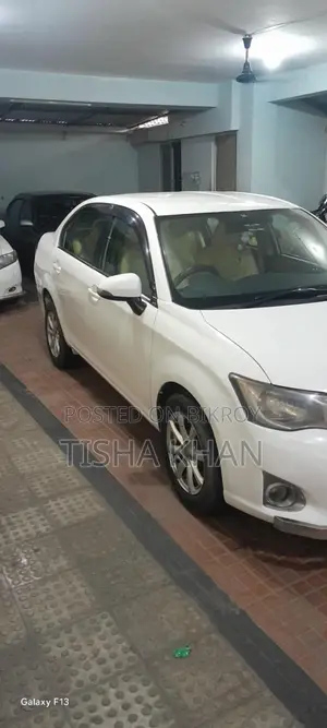 টয়োটা অ্যাক্সিও ১.৫ জি ২ডব্লিউডি ২০১৪ হোয়াইট
