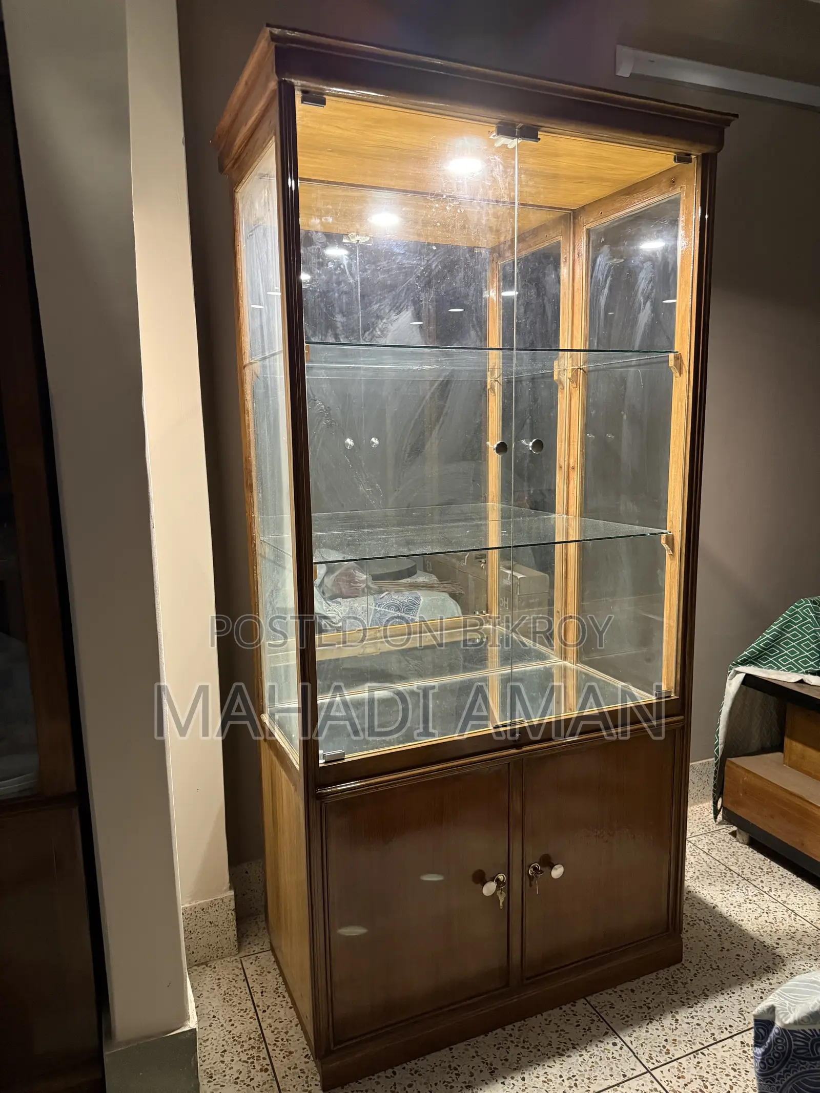 Segun Wood Showcase With Glass Shelves and Mirror Back