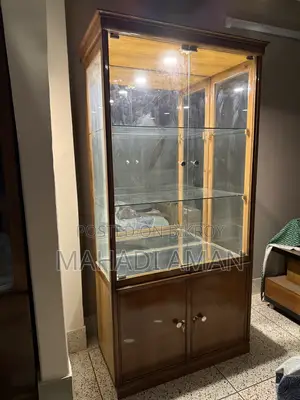 Segun Wood Showcase With Glass Shelves and Mirror Back