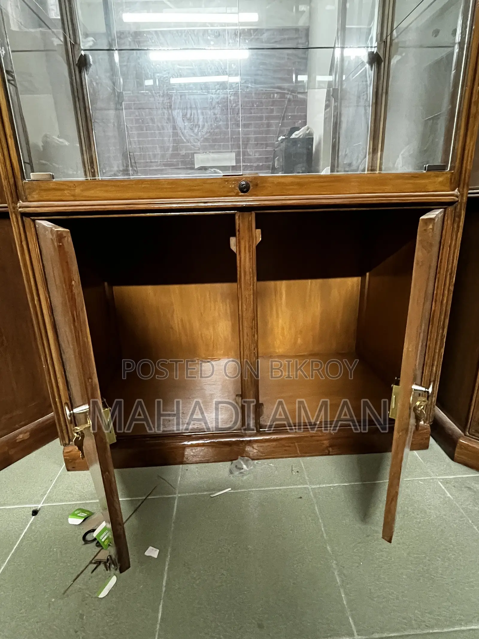 Segun Wood Showcase With Glass Shelves and Mirror Back