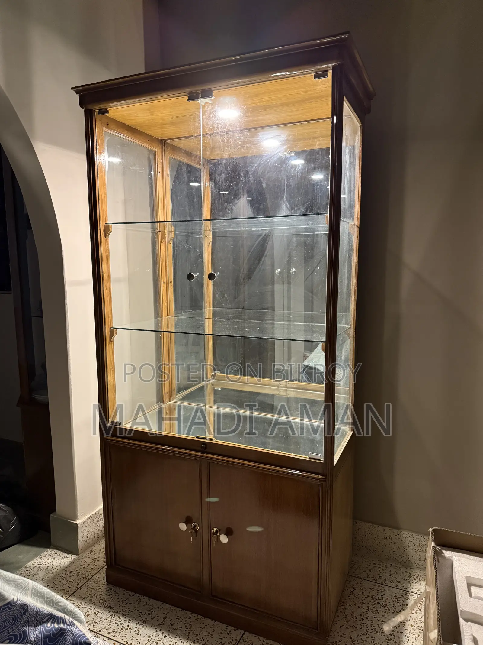 Segun Wood Showcase With Glass Shelves and Mirror Back