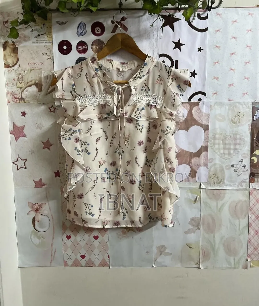 beige ruffled blouse