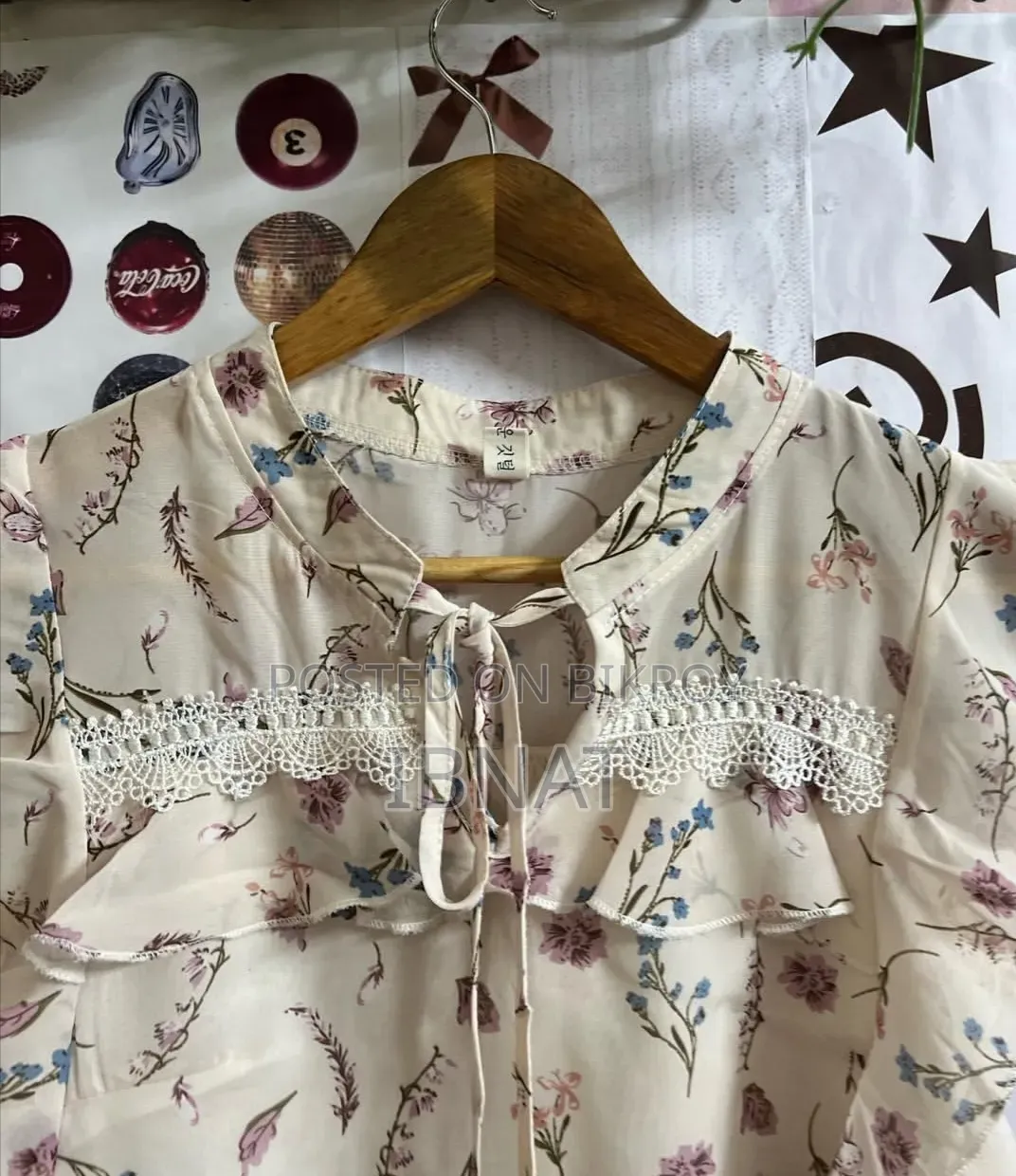 beige ruffled blouse