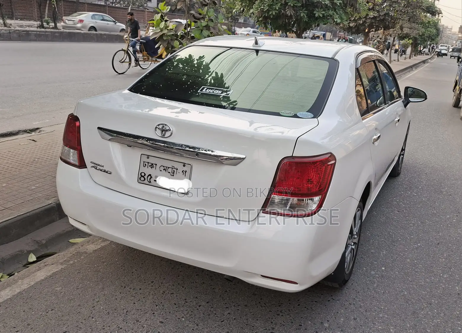 টয়োটা এক্সিও ২০১৫ সাদা