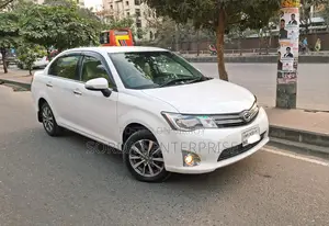 টয়োটা এক্সিও ২০১৫ সাদা