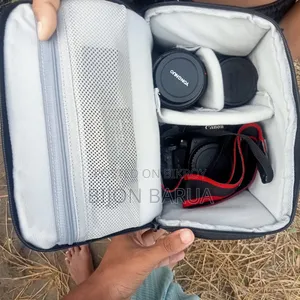 ক্যানন ৭৬০ডি ক্যামেরা ৬৪ মিমি জুম লেন্স ৫২ মিমি প্রাইম লেন্স এবং একটি বক্সসহ