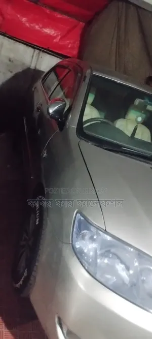 টয়োটা করোল্লা ২০০৪ বেইজ