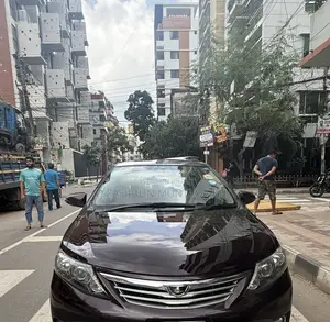 নতুন টয়োটা অ্যালিয়ন ২০১৫ বারগান্ডি