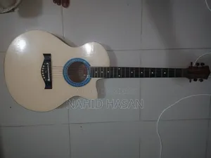 ইউজড একোয়াস্টিক গিটার