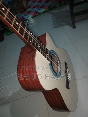 ইউজড একোয়াস্টিক গিটার