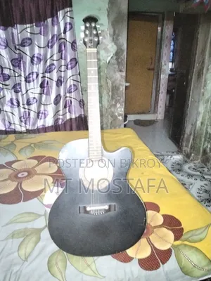 একটি ইন্ডিয়ান সিগনেচার গিটার সেল করা হবে