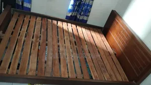 Beautifully Designed Processed Wood Double Bed (Good Condition)