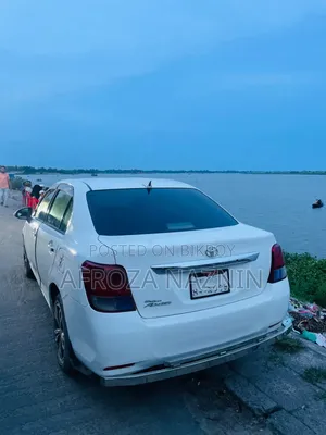 টয়োটা এক্সিও ২০১৩ পার্ল