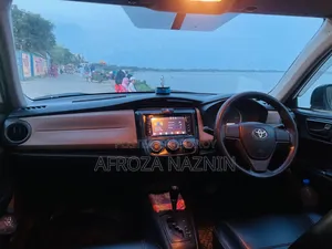 টয়োটা এক্সিও ২০১৩ পার্ল