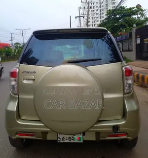 টয়োটা রাশ ১.৫ রিয়ার হুইল ড্রাইভ ২০১১ গোল্ড