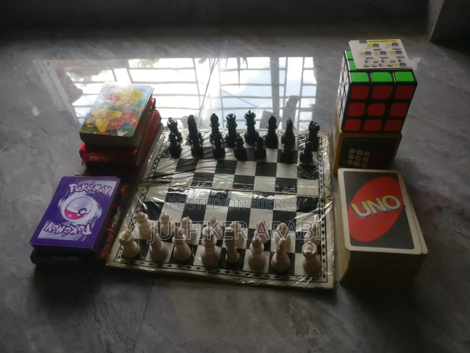 Rubik's cube. Ludo. UNO. Pokemon. Playing cards.