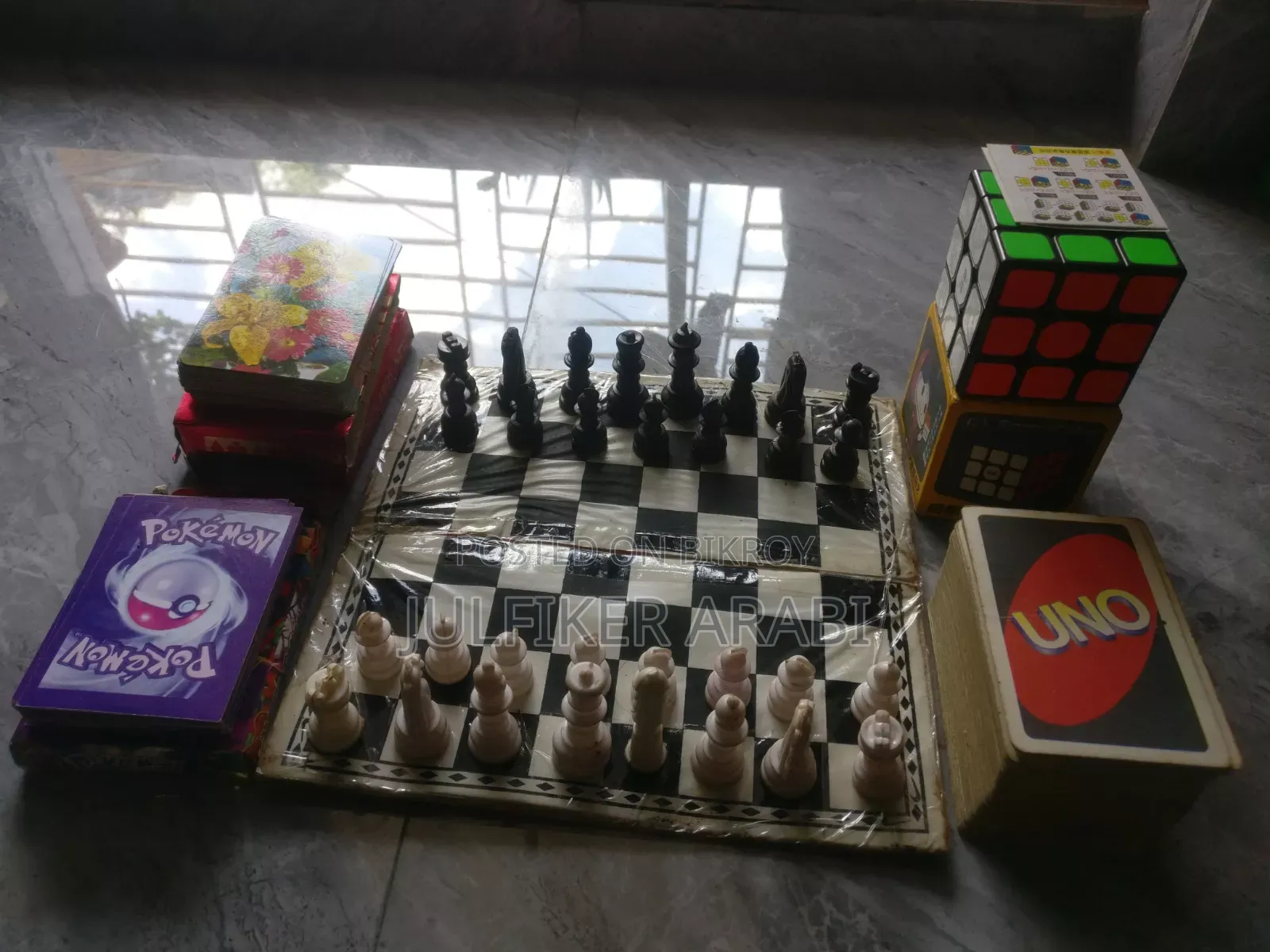 Rubik's cube. Ludo. UNO. Pokemon. Playing cards.