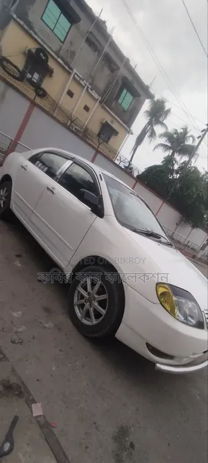 টয়োটা করোল্লা ২০০৩ সাদা