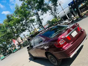 টয়োটা প্রমিও ২০০৪ মেরুন