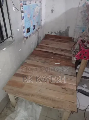 One Single Bed and One Box Table
