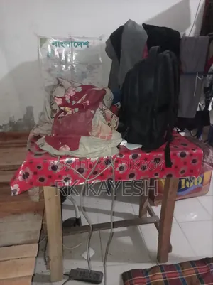 One Single Bed and One Box Table