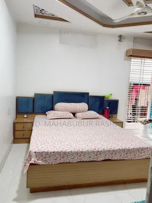 সাইড টেবিল সহ খাট