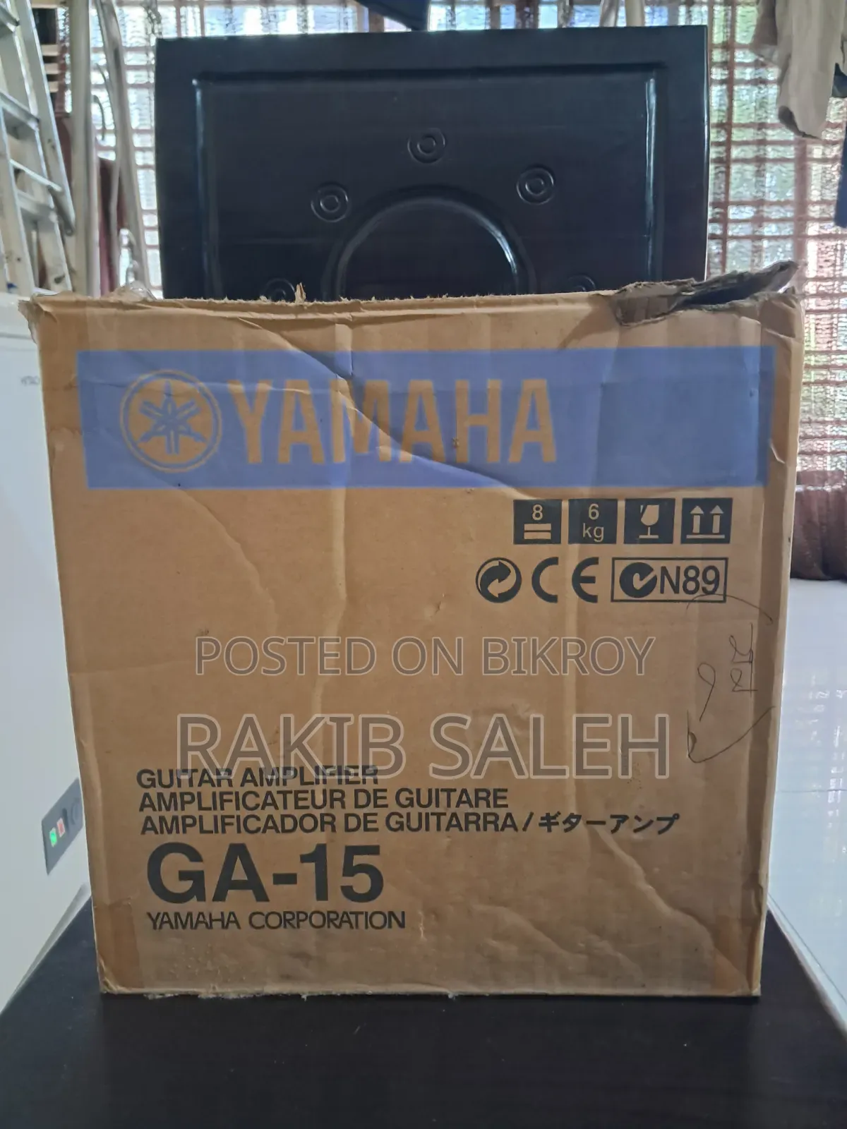 A Yamaha GA-15 Electric Guitar Amplifier in Its Original Package