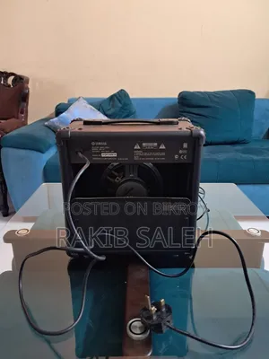 A Yamaha GA-15 Electric Guitar Amplifier in Its Original Package