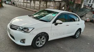 টয়োটা এক্সিও ২০১২ সাদা