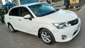 টয়োটা এক্সিও ২০১২ সাদা