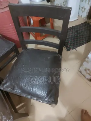 Three Wooden Chairs with Cushions