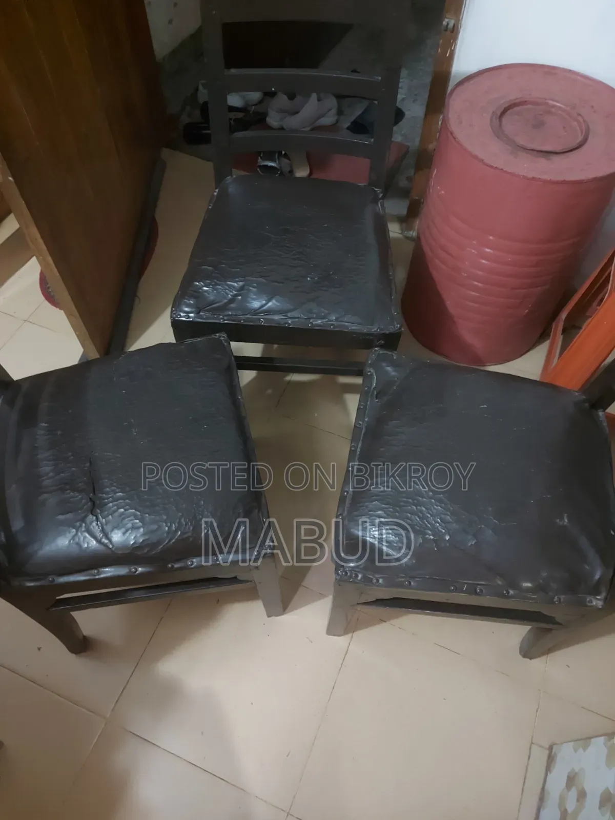 Three Wooden Chairs with Cushions