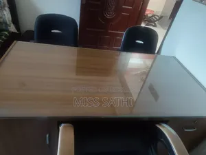 3 Chairs 1 Table.
