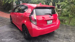 টয়োটা অ্যাকোয়া ২০১৫ রেড