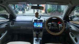 টয়োটা অ্যাক্সিও ২০১১ সাদা