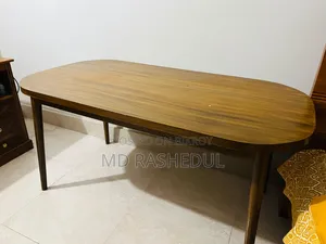 For Sale – A wooden table will be sold.