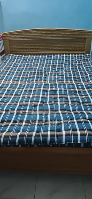 Wooden Bed 5 feet × 7 feet