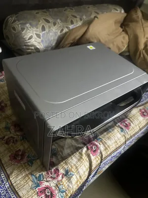 Sharp 25 LTR R-72e0(sm) Grill Microwave Oven