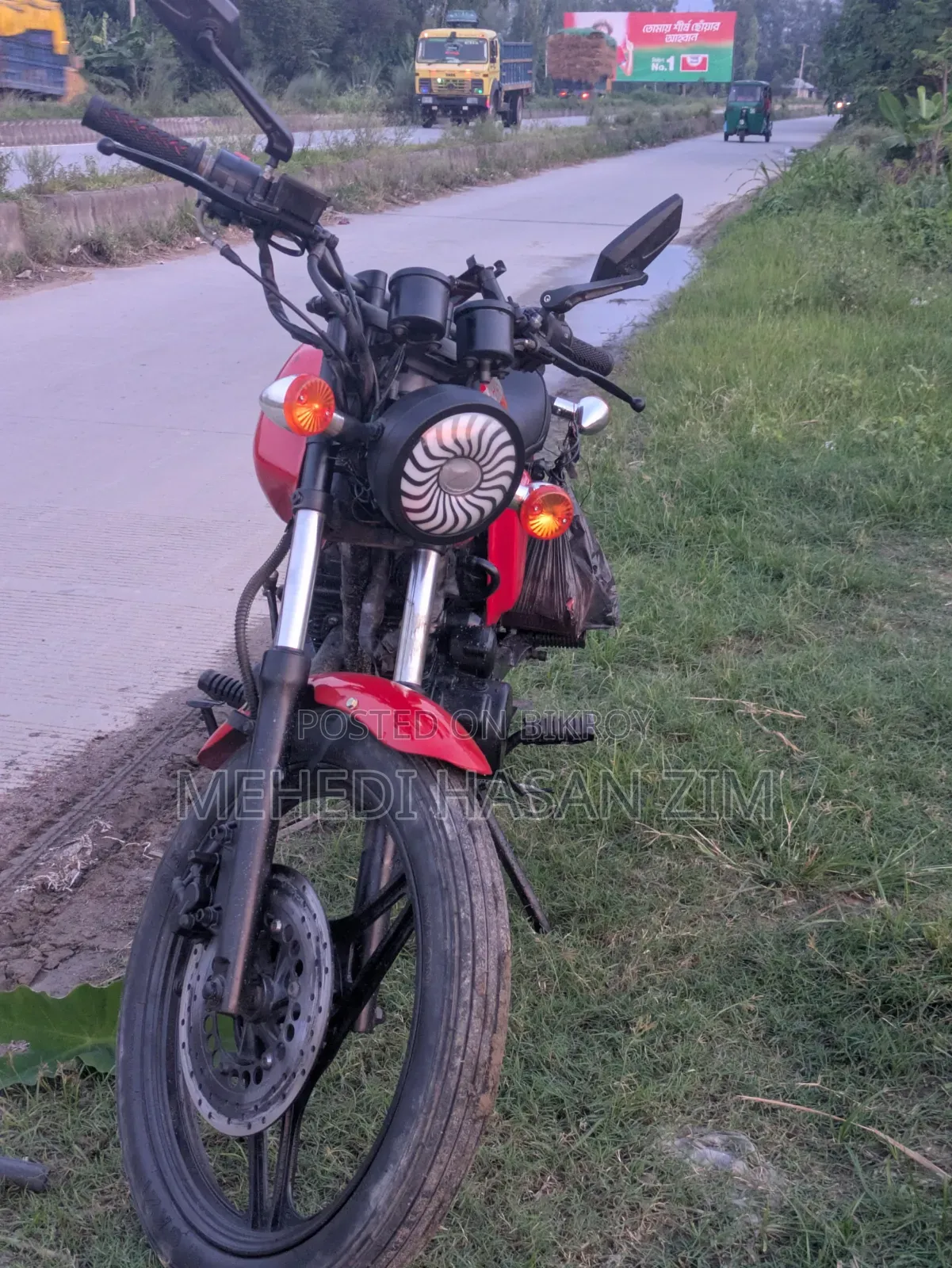 দায়ুন ডিওয়াই১০০-এ ২০০৯ লাল