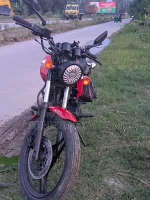 দায়ুন ডিওয়াই১০০-এ ২০০৯ লাল