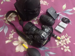 নিকন ডি৫২০২ ডিএসএলআর ক্যামেরা দুটি লেন্সসহ: ৫০ মিমি প্রাইম এবং ১৮-৫৫ কিট লেন্স