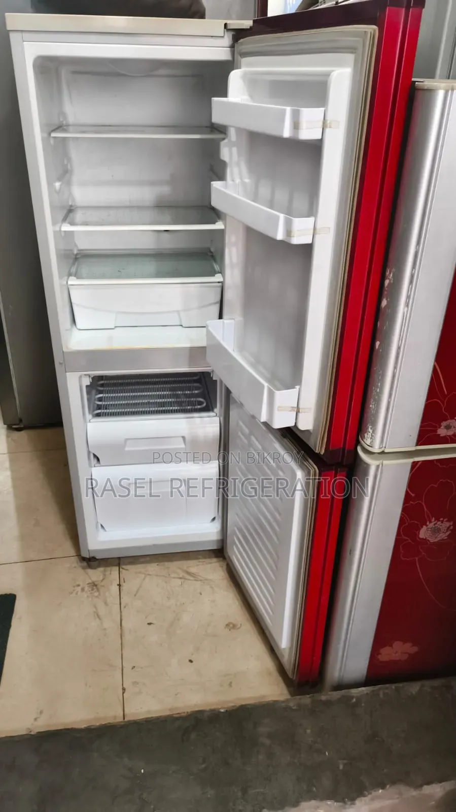 Red 15 CFT LG running fridge for sale.