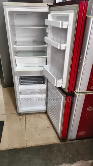 Red 15 CFT LG running fridge for sale.